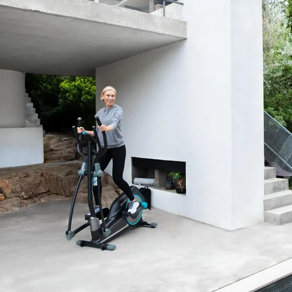 Imagen 5 Bicicleta elíptica DrumFit Elliptical 9000 Eir Pro con resistencia magnética regulable por motor, pantalla LCD, soporte para móvil y ruedas de transporte.