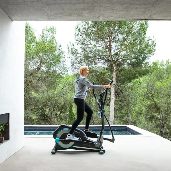 Imagen 7 Bicicleta elíptica DrumFit Elliptical 9000 Eir Pro con resistencia magnética regulable por motor, pantalla LCD, soporte para móvil y ruedas de transporte.