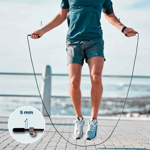 Imagen 6 Comba de velocidad profesional DrumFit Speed Jump Rope de Cecotec. Diseñada con rodamientos de alta precisión y cable ajustable para entrenamientos intensos.
