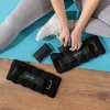 Imagen 4 Set de 2 pesas ajustables DrumFit AnkelBell 2500 Neo para tobillos y muñecas. Peso adaptable de 0,5 a 2,5 kg con sacos de arena y correas de velcro.