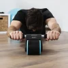 Imagen 5 Rueda abdominal Drumfit AB Fit de Cecotec con rebote automático. Su diseño compacto de 10 cm de ancho incluye esterilla acolchada. Soporta hasta 100 kg.