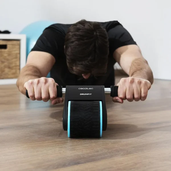 Imagen 5 Rueda abdominal Drumfit AB Fit de Cecotec con rebote automático. Su diseño compacto de 10 cm de ancho incluye esterilla acolchada. Soporta hasta 100 kg.