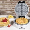 Imagen 4 Gofrera eléctrica 3 en 1 de 700 W con diseño circular. Incluye placas intercambiables con revestimiento RockStone ecológico para gofres, donuts y muffins.