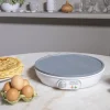 Imagen 6 Crepera eléctrica de 1000 W con revestimiento RockStone antiadherente. Dispone de termostato regulable y placa de 30,5 cm para resultados óptimos y fáciles.