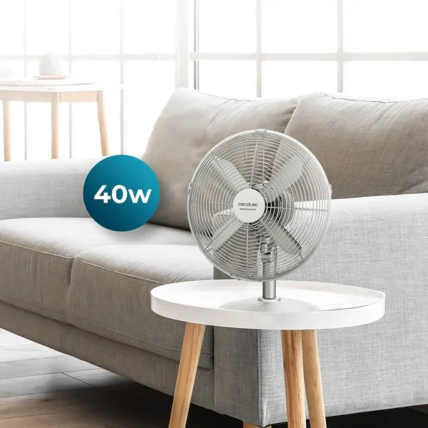 Imagen 2 Ventilador de sobremesa de 40 W con diseño retro cromado y 4 aspas. Ofrece 3 velocidades, oscilación automática y tecnología silenciosa para máximo confort.