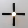 Imagen 3 Ventilador de techo de 42 pulgadas y 50 W en acabado negro. Cuenta con 4 aspas reversibles, lámpara integrada y función invierno-verano para climatización eficiente.