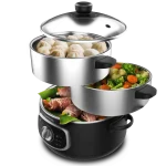 Vaporera eléctrica Cecotec Vapovita SteelPot de acero inoxidable con tres niveles de cocción llenos de verduras y alimentos al vapor