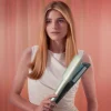 Imagen 6 Protege tu cabello con RitualCare Air Lisse Champagne. Plancha con aire, tecnología iónica, queratina y aceite de argán para un alisado brillante y saludable.