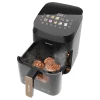 Imagen 2 Freidora de aire 4,5 L y 1900 W con grill y ahumador. Logra sabores a brasa, texturas crujientes y cocciones saludables sin aceite en carnes y verduras.