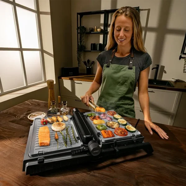 Imagen 7 Parrilla eléctrica de 2000 W con tecnología Smokeless y sonda de temperatura PerfectCook. Ideal para smash burgers gracias a su diseño y potencia.