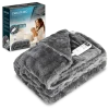 Manta eléctrica doble Cecotec HeatConfort Noa de 200 x 180 cm color gris extendida sobre la cama